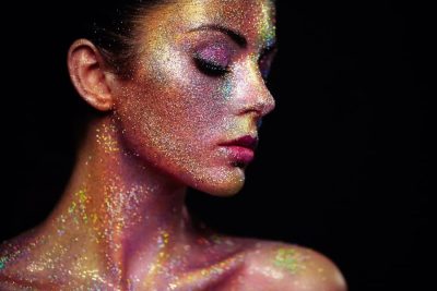 Portrait of woman with glitter makeup